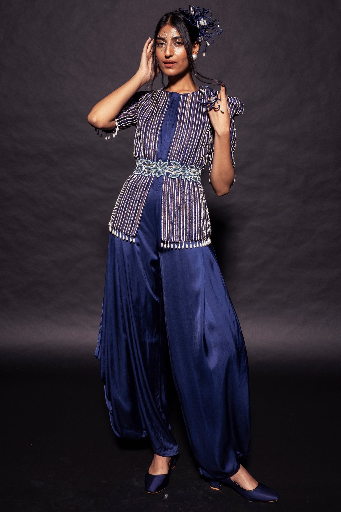 Deep blue side cowl jumpsuit with Ajrakh embellished jacket with patchwork waistbelt