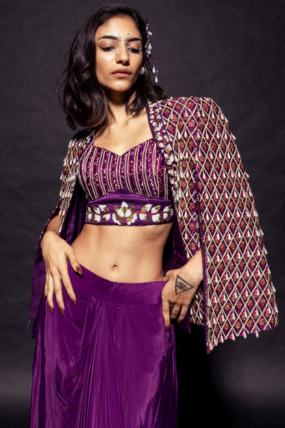 Dark purple Fully embroidered ajrakh cape jacket with heavily embellished blouse and drape skirt