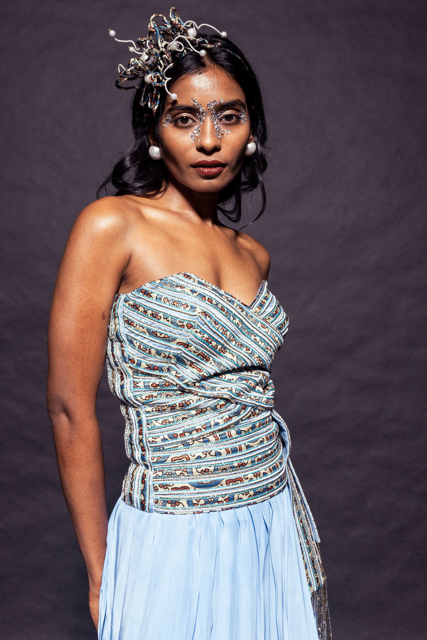 Powder blue ajrakh stripped corset with Pleated pants