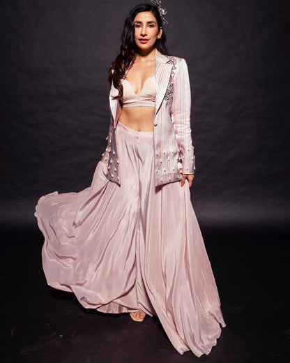 Parul Gulati in Peachy Pink Bralette and flare pants with embellished ajrakh patchworked jacket