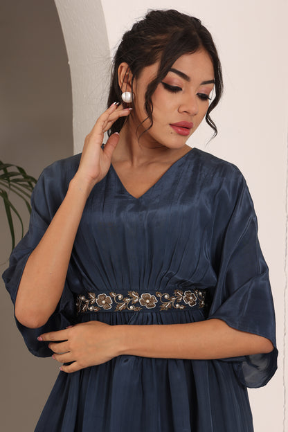 Blue pleated top with ajrakh pants and belt