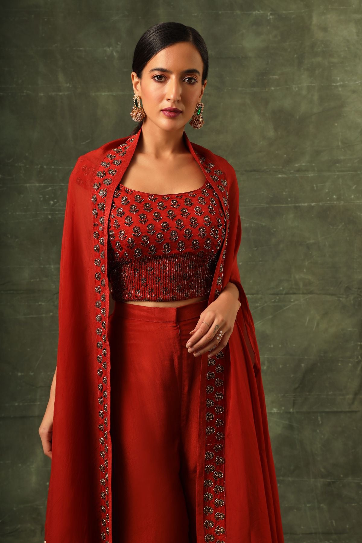 Red Ajrakh blouse and  double layered flare pants with cape dupatta