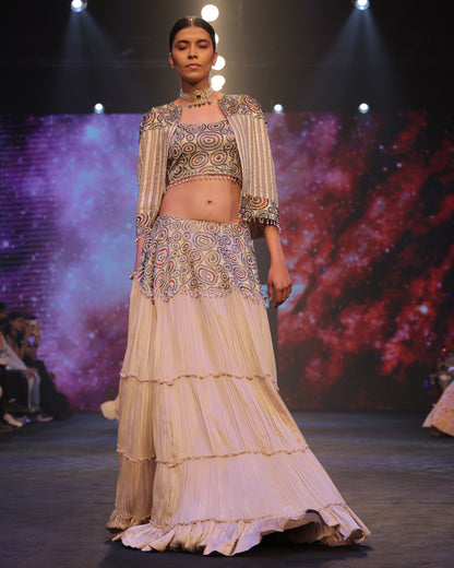 Cream Ajrakh embellished blouse and cape with layered lehenga.