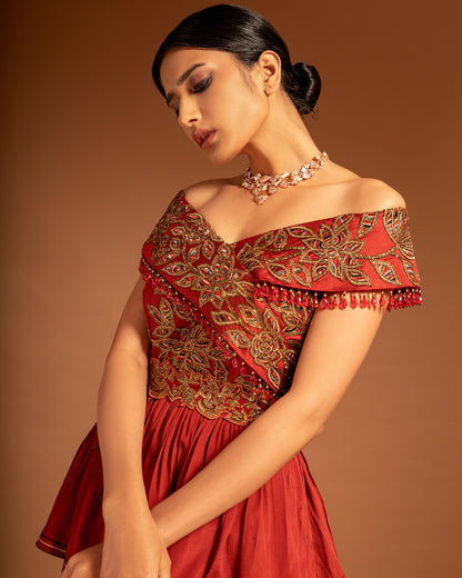 Maroon off shoulder layered Gown.