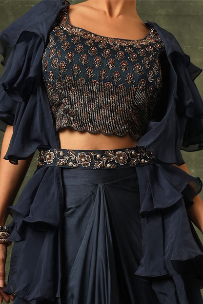 Blue Ajrakh blouse and  layered jacket with embroiderd waisrband and drape dhoti