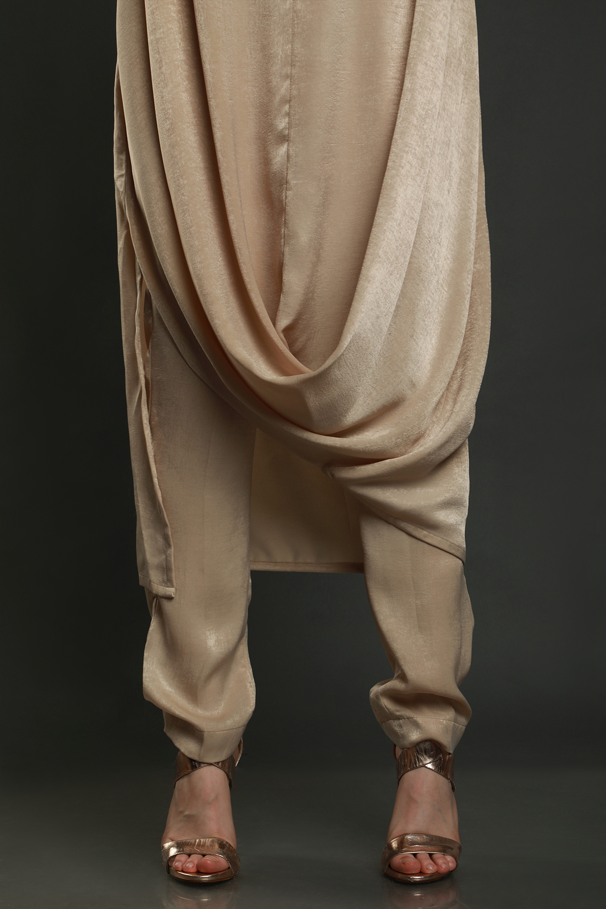 "Elevate your style with our Sand Beige Velvet Crepe Drape Tunic & Pants Set. Hand-embroidered with exquisite details. Perfect for any occasion."