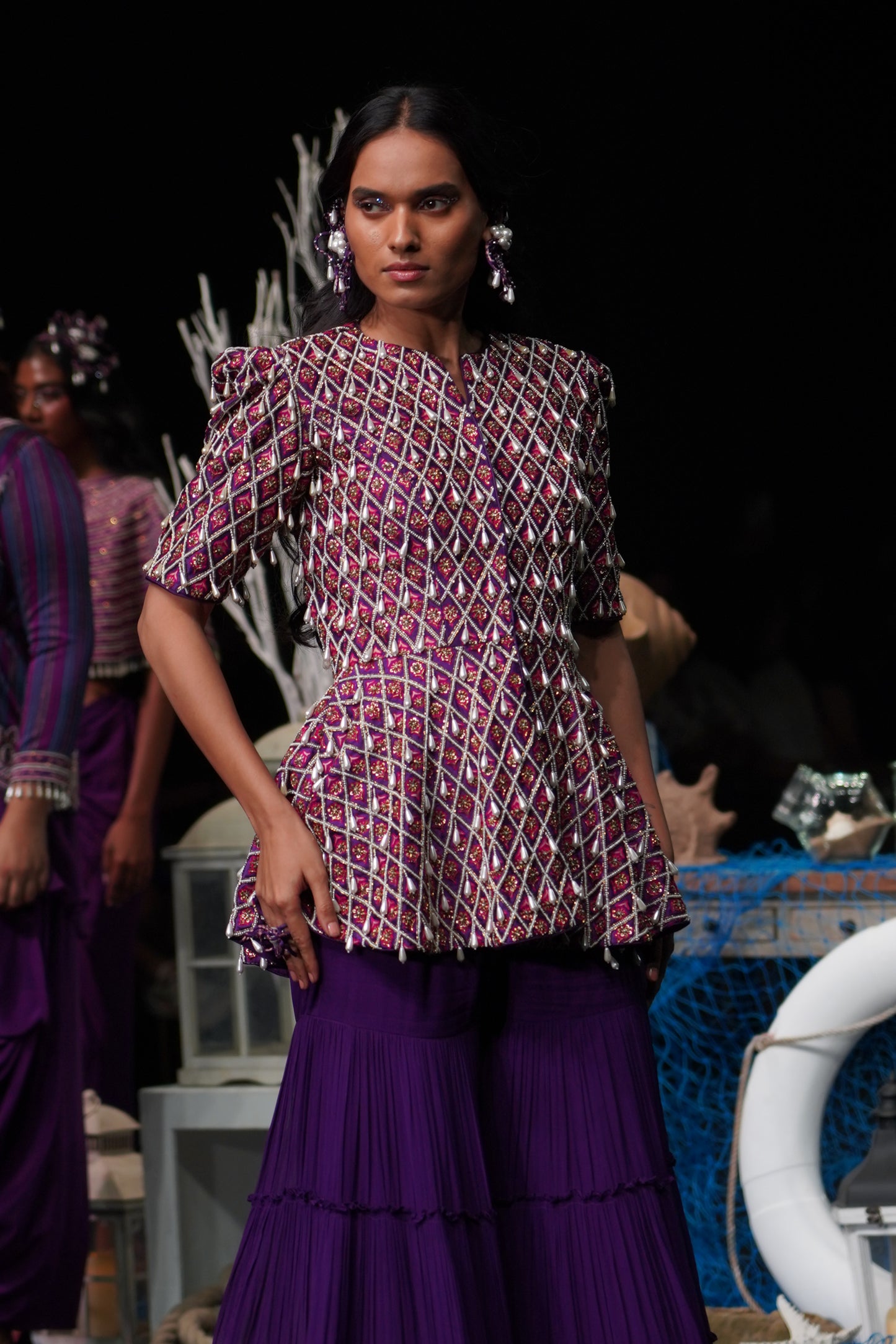 Purple fully embellished ajrakh peplum top with gathered sharara set