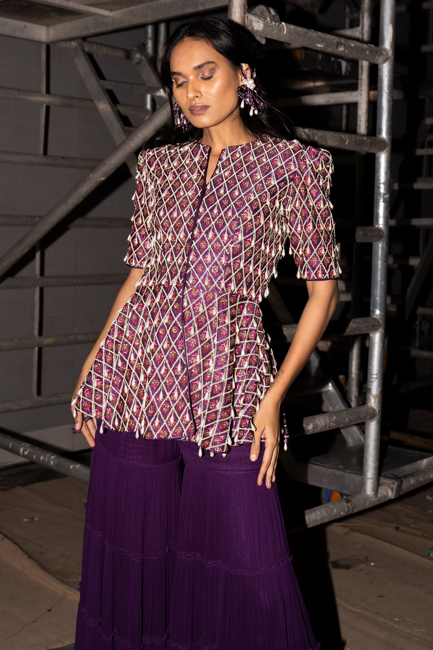 Purple fully embellished ajrakh peplum top with gathered sharara set