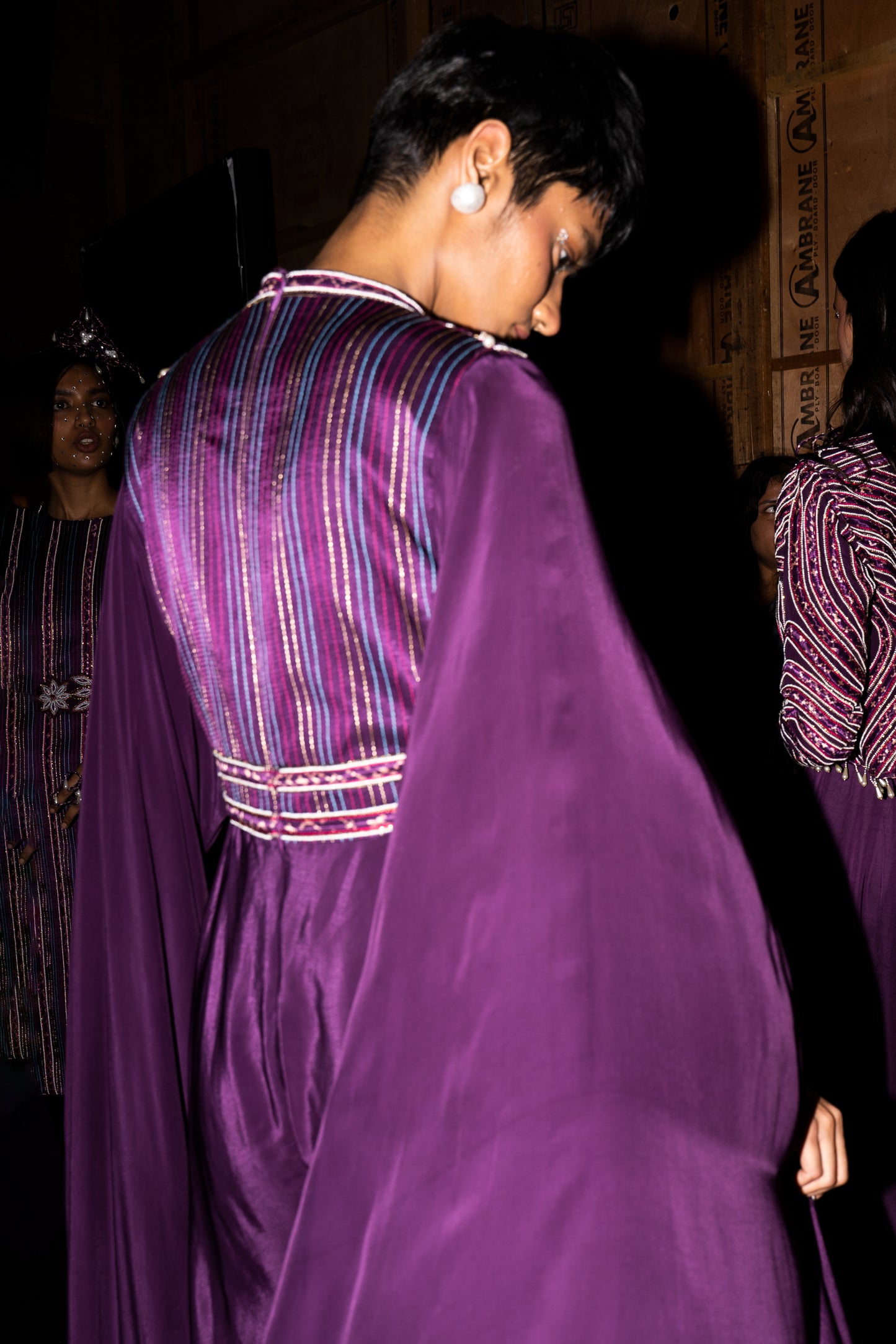 Purple heavily embellished jumpsuit wiwth embroidered cape sleeves