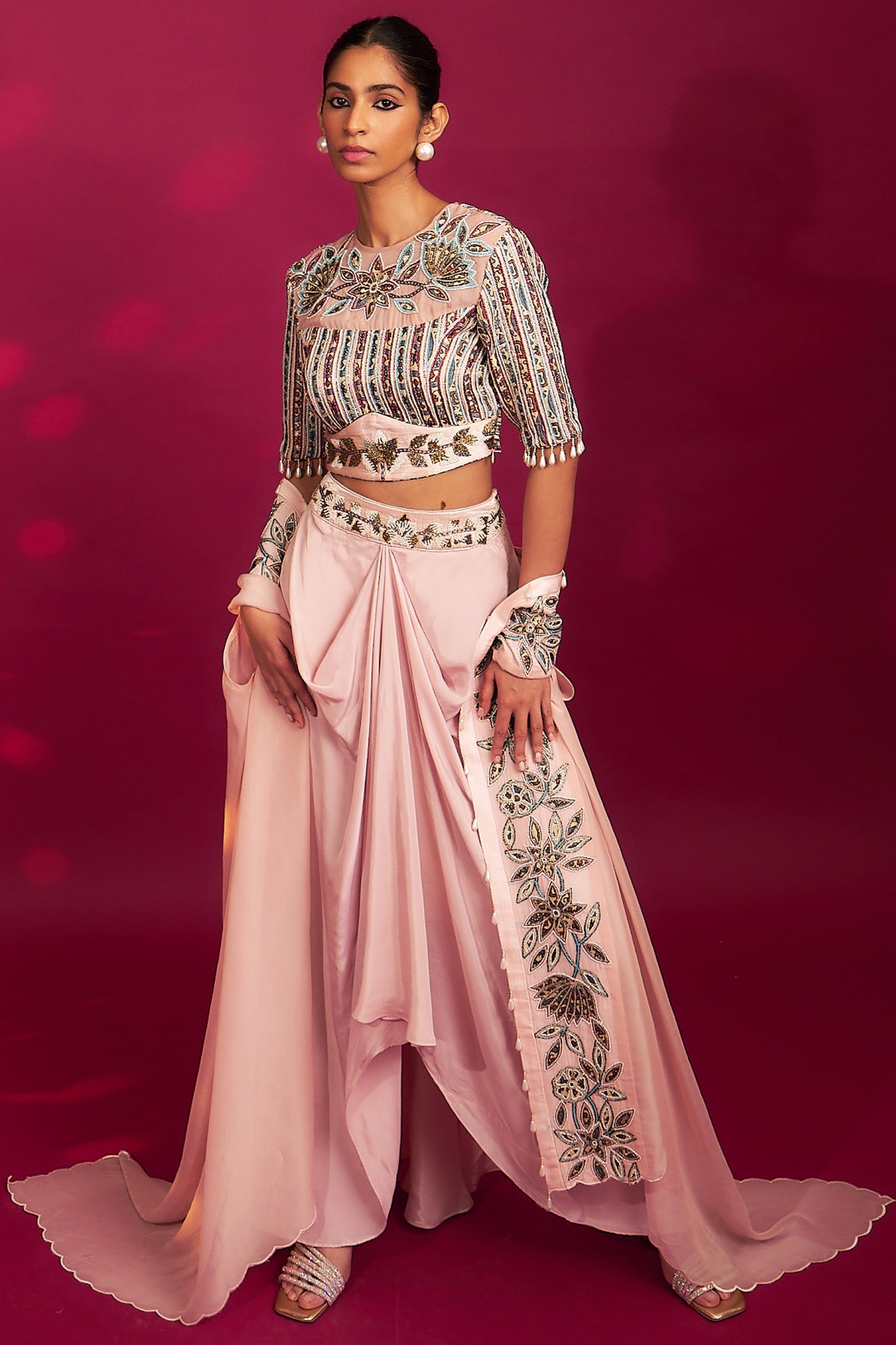 Peachy pink embellished ajrakh blouse with embroidered cape and dhoti