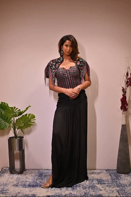 Nikki Deol in Black Embellished Short Jacket and corset with  Draped Skirt Set