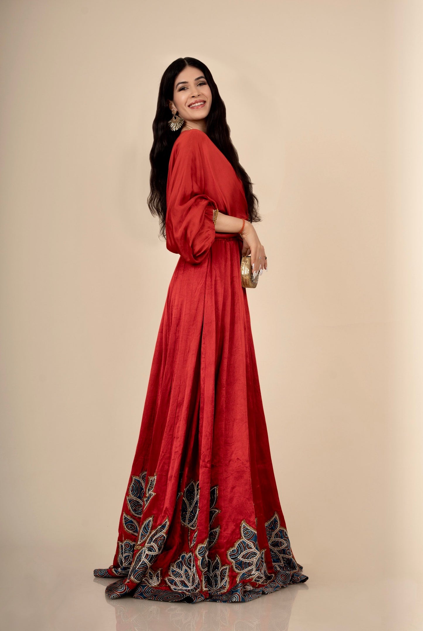 Baandgee Kalra in Red Poncho sleeve patchworked Gown with Belt