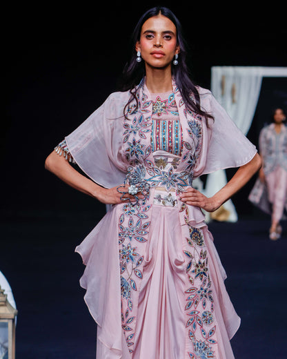 Peachy pink Ajrakh embroidered blouse paired up with Dhoti and ruffled dupatta