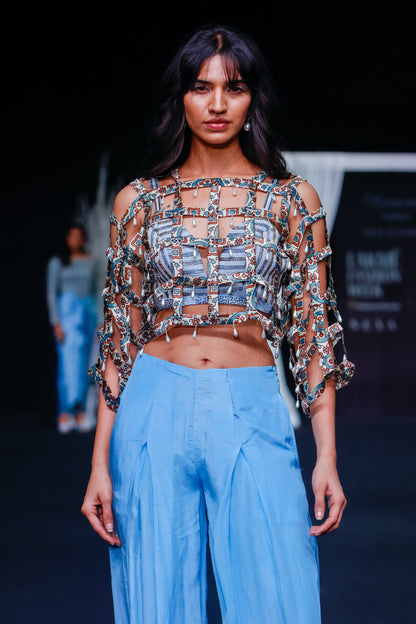 Powder blue ajrakh stripped jacket with embellished brallete and inverted pleated pants