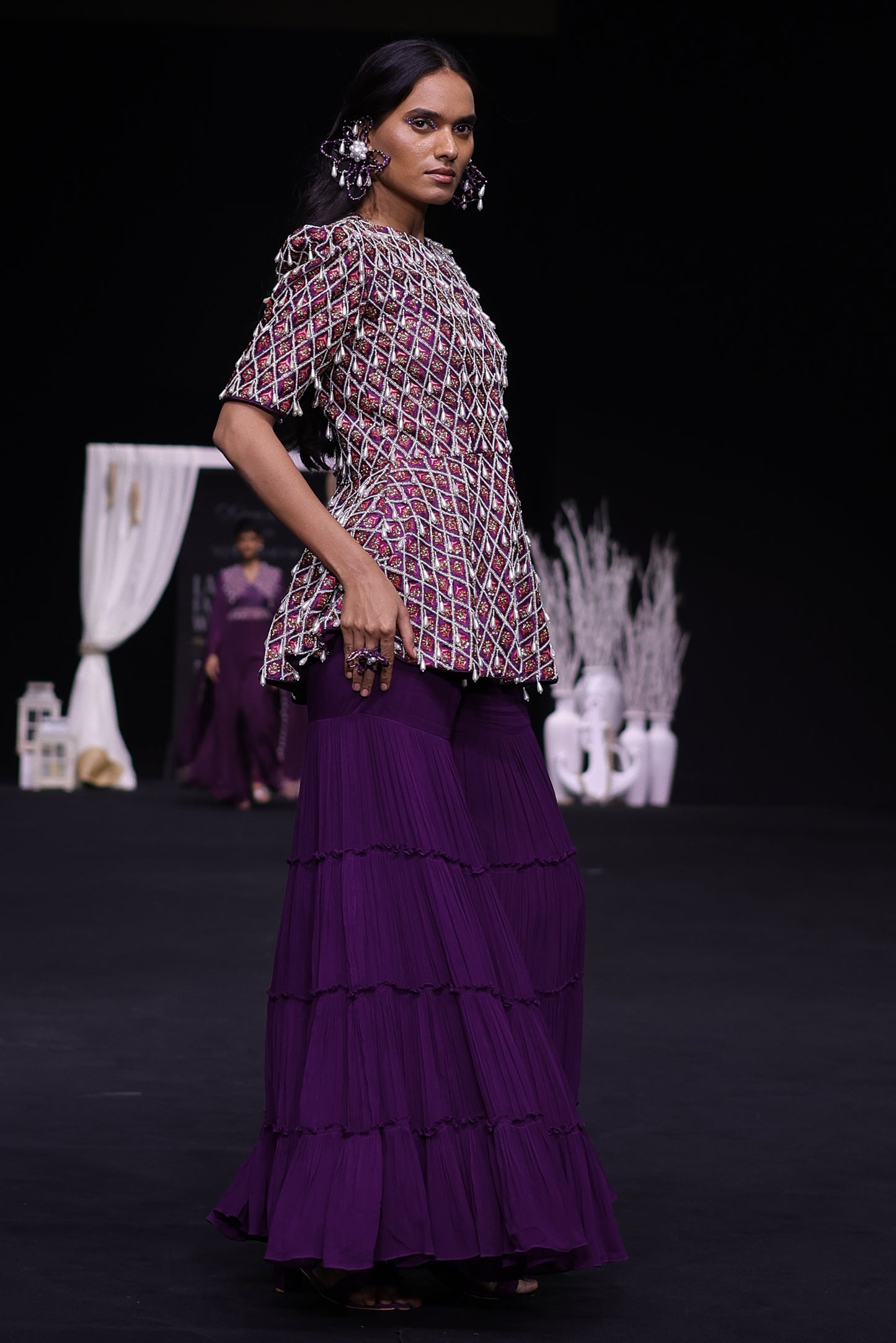 Purple fully embellished ajrakh peplum top with gathered sharara set