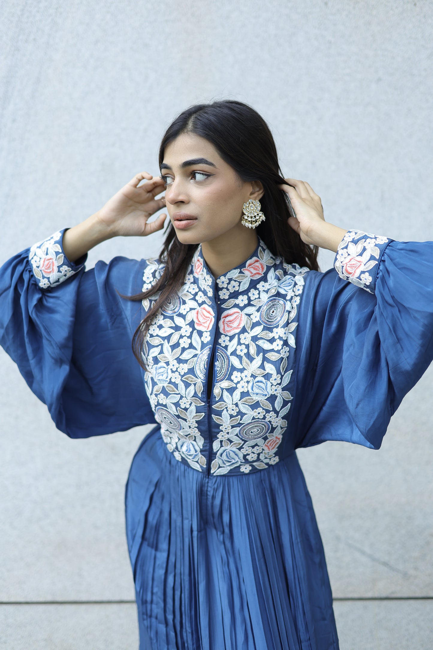 Yashita Chandrashekhar in Blue embroidered butterfly sleeve gathered dress.