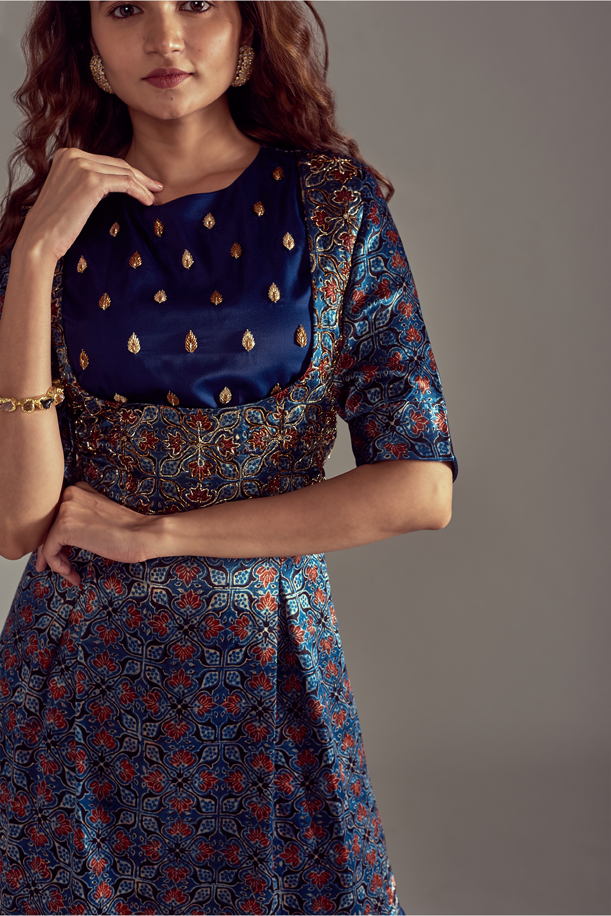 "Charming Cobalt Blue Short Kurti in Mashru Silk Ajrakh Print, adorned with Nakshi Embroidery, perfectly paired with Pleated Dhoti for a graceful look."
