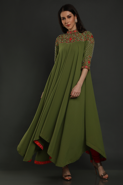 Elevate your elegance in a Mehendi Green Moss Crepe asymmetric maxi dress. Hand-embroidered with thread, pearls, and cut dana work for a unique flair.