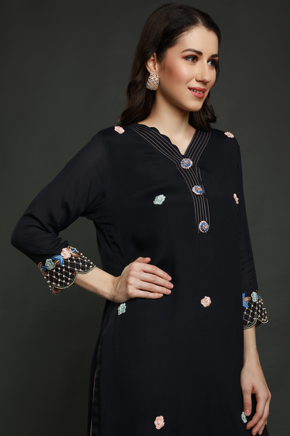 "Exquisite midnight blue crepe kurta paired with flared bottom garara style pants & shaded dupatta adorned with resham thread, moti beads, cutdana work"