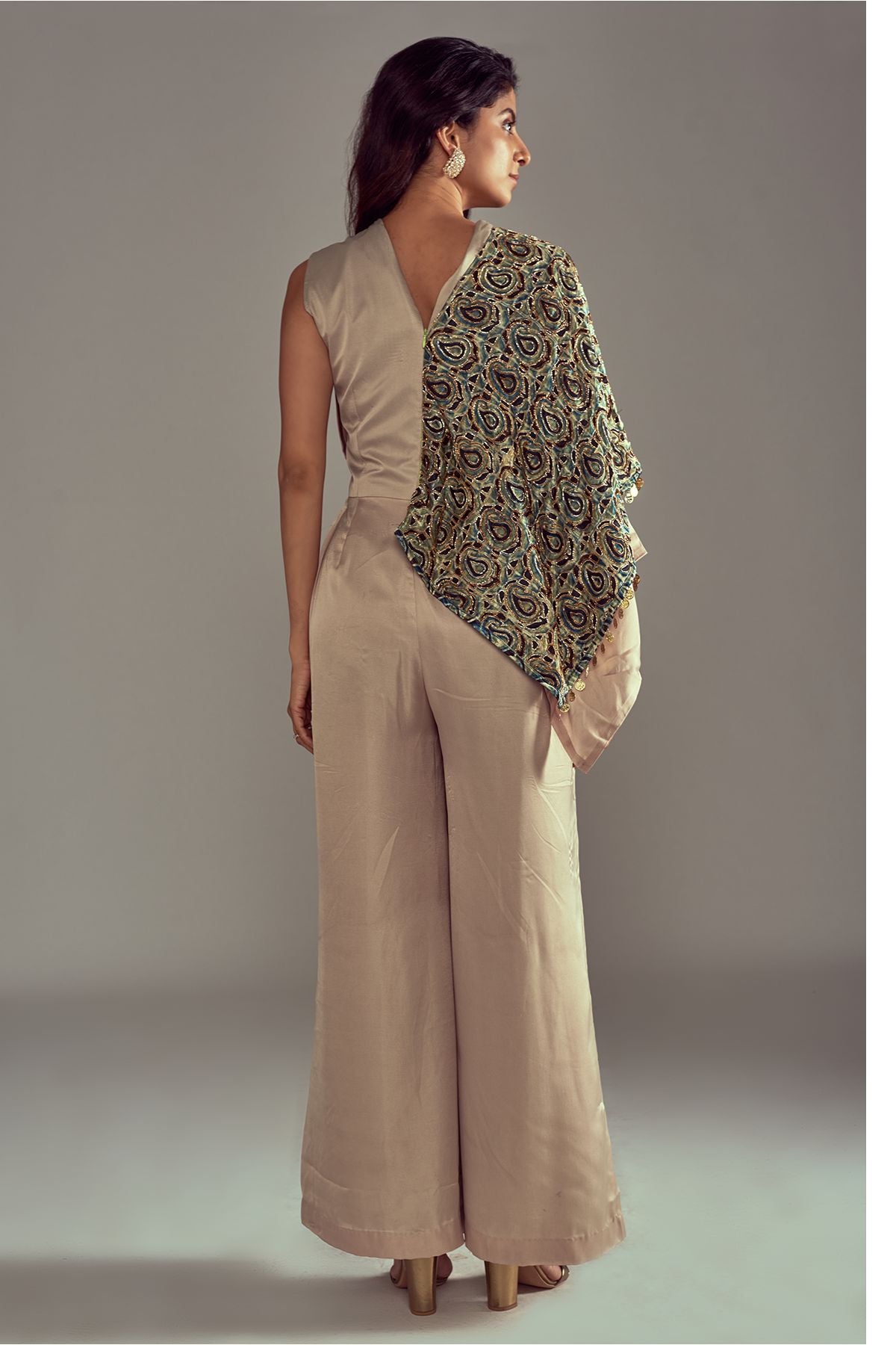 "Stylish Dark Beige Drape Jumpsuit in Pure Satin Crepe, featuring Intricate Detailing on the Flap. Embrace elegance and make a statement in this ensemble!"