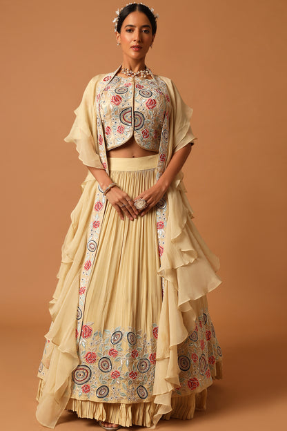 Ivory Embroidered blouse with Gathered lehenga and ruffle dupatta.