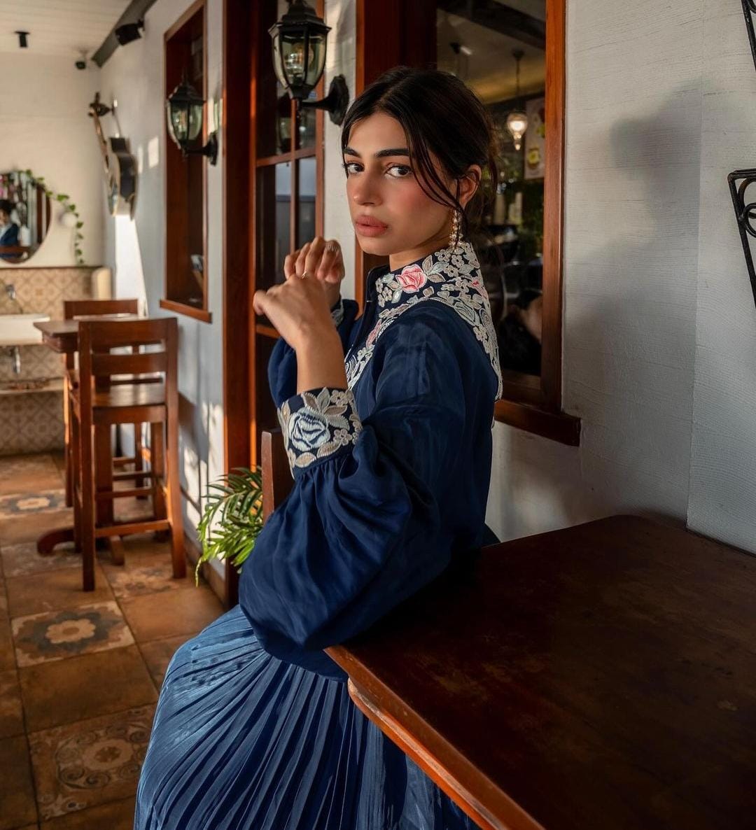 Yashita Chandrashekhar in Blue embroidered butterfly sleeve gathered dress.