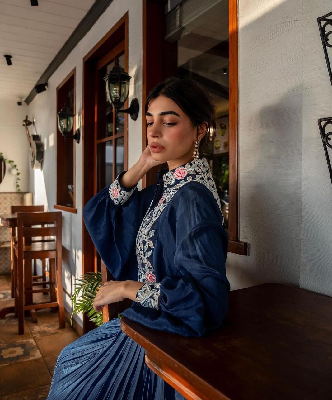 Yashita Chandrashekhar in Blue embroidered butterfly sleeve gathered dress.