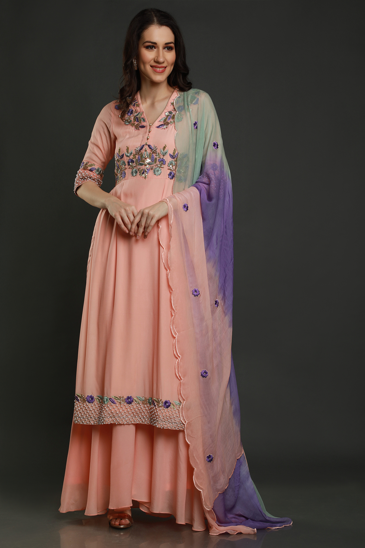 "Chic peach kurta with threadwork, sequins, cutpipe, & bead embellishments, paired with umbrella garara & shaded chiffon dupatta - A stylish fusion outfit!"