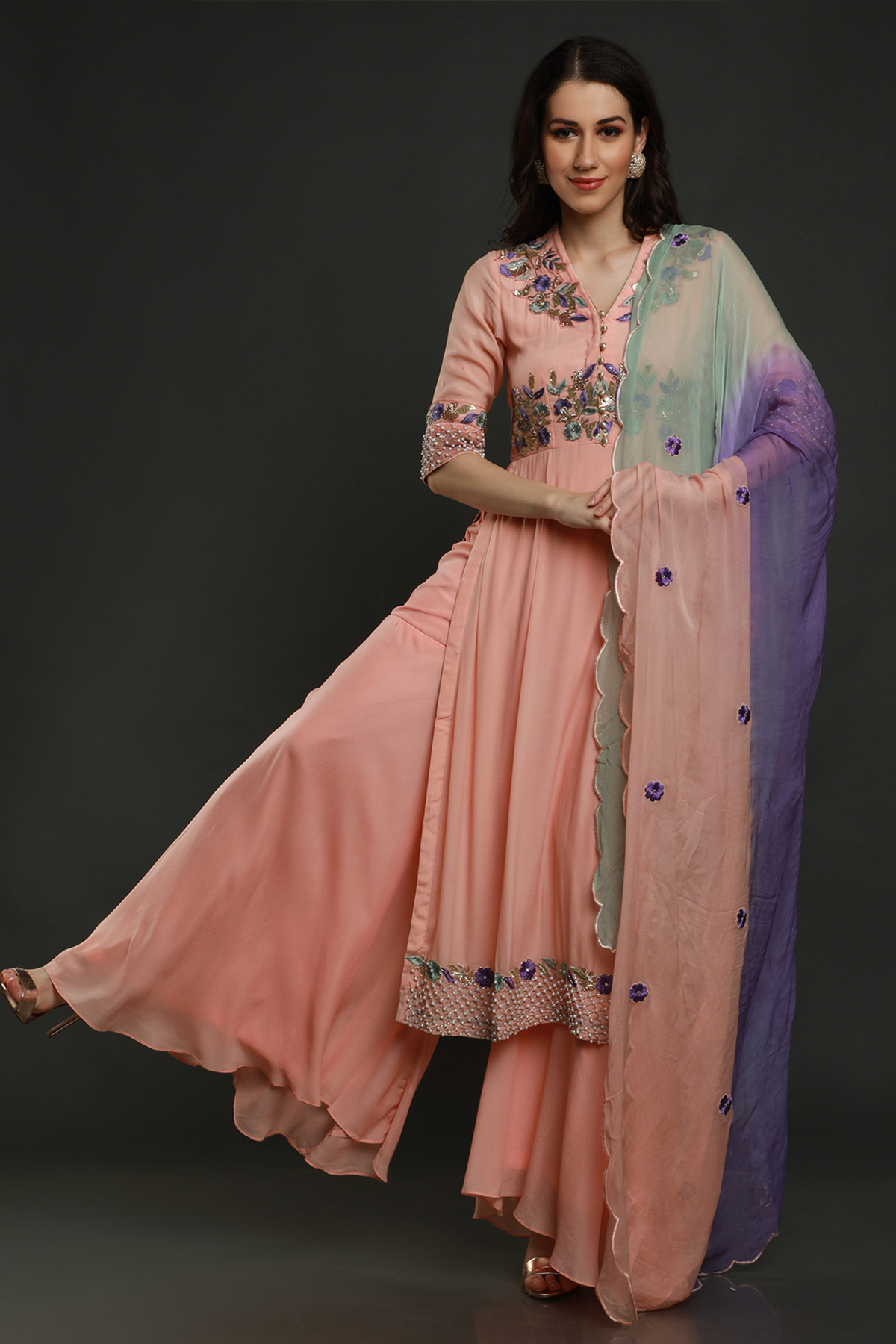 "Chic peach kurta with threadwork, sequins, cutpipe, & bead embellishments, paired with umbrella garara & shaded chiffon dupatta - A stylish fusion outfit!"