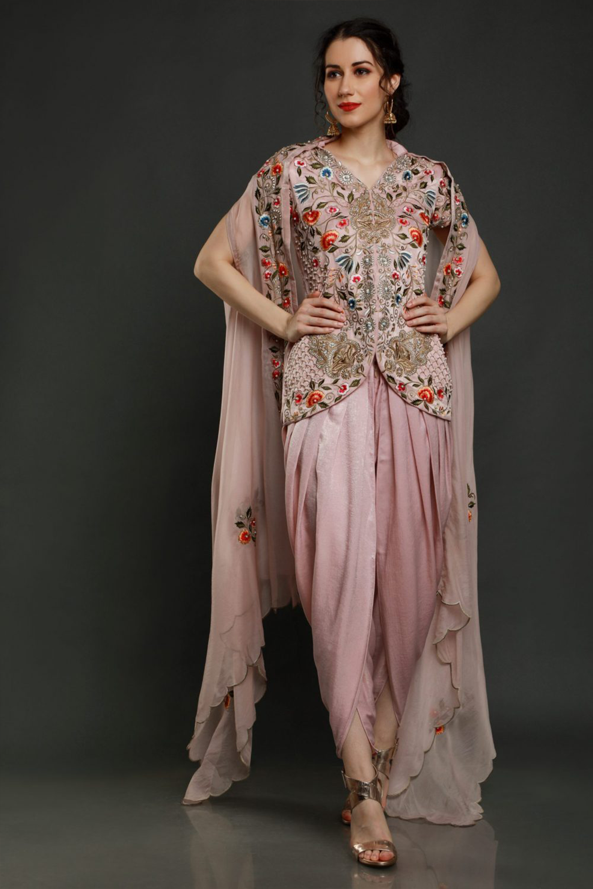"Elegant Dusky Pink Velvet Crepe Tunic with Intricate Embroidery, paired with Velvet Crepe Dhoti and Organza Dupatta. Shop the luxe ensemble now!"