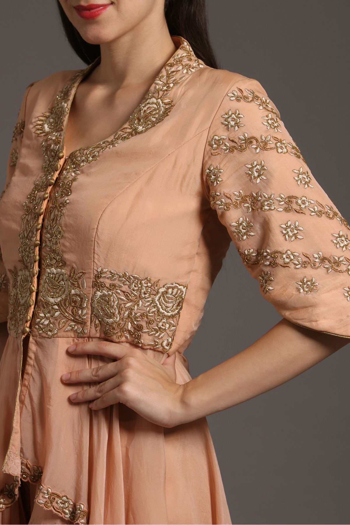 "Graceful Peach Organza Peplum Tunic with Embroidery, paired with Crepe Dhoti Pants. Embrace elegance and shop now for your special occasions."