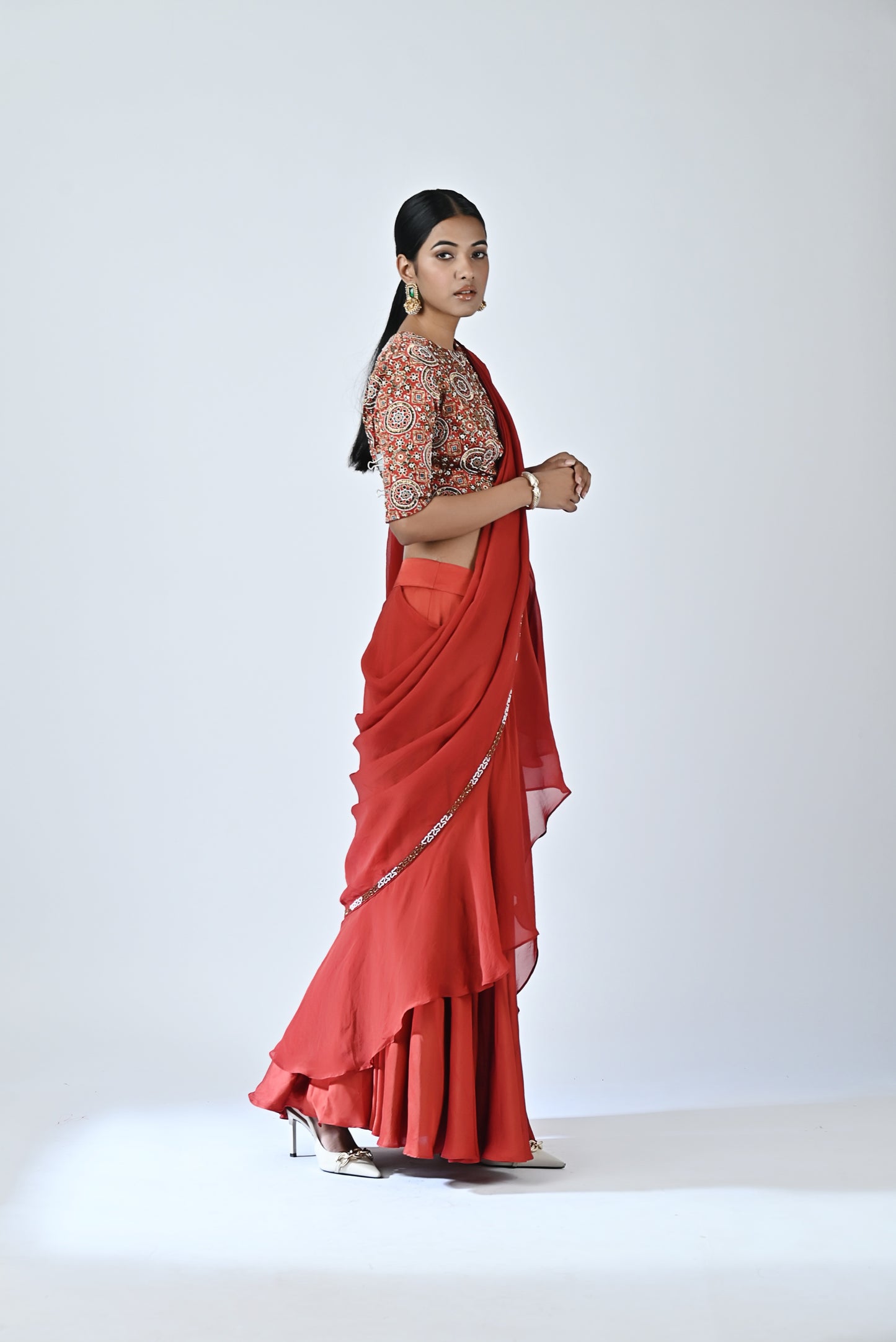 Red embroidered drape saree set