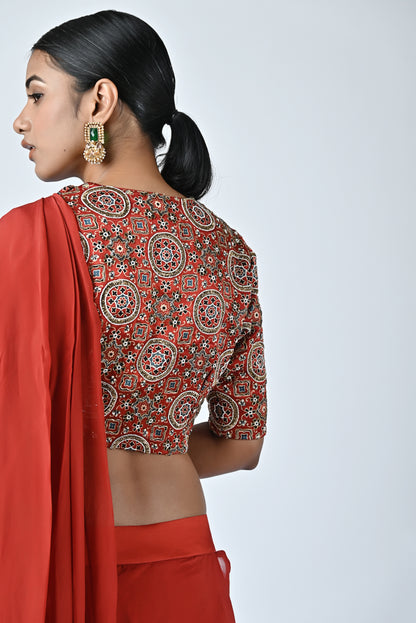 Red embroidered drape saree set